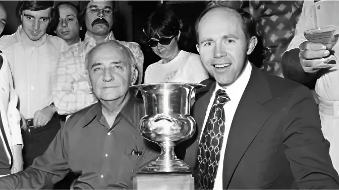 Johnny Moss (left) posing with Jack Binion (right) following his win in the inaugural 1970 Main Event.