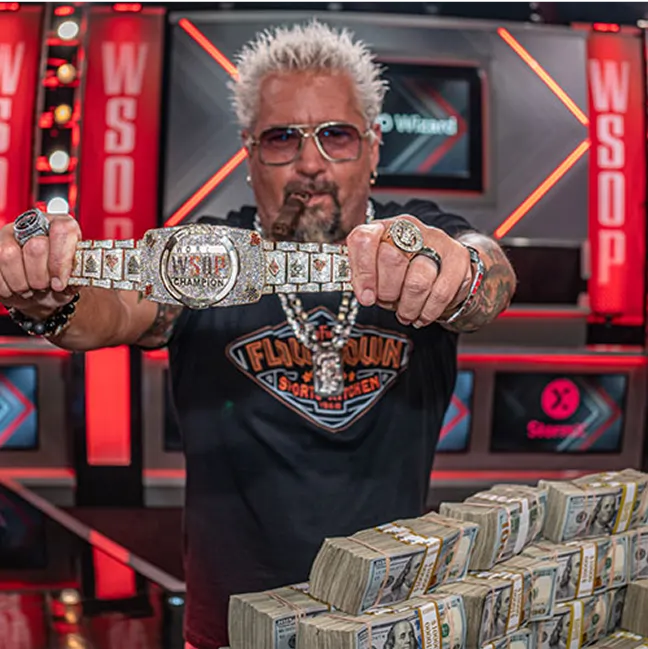 Guy Fieri with the 2024 WSOP Main Event bracelet