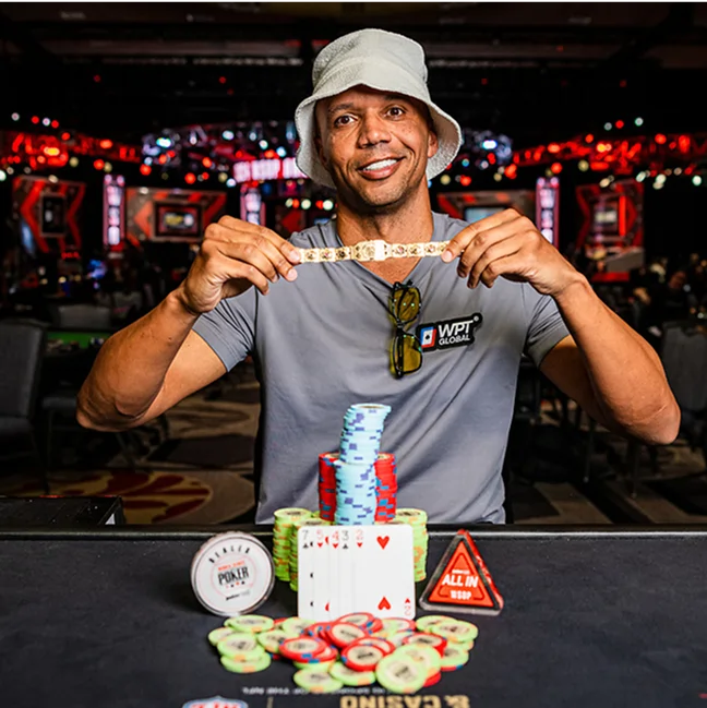 Phil Ivey posing with bracelet #11 at the 2024 WSOP