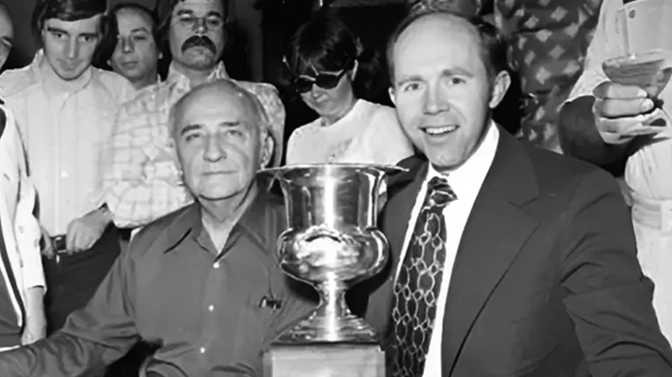 Johnny Moss (left) posing with Jack Binion (right) following his win in the inaugural 1970 Main Event.